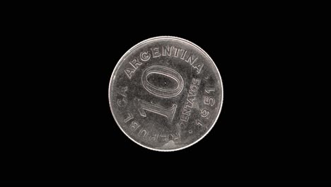 argentina 1951 10 centavos coin obverse with large denomination rotating on black background