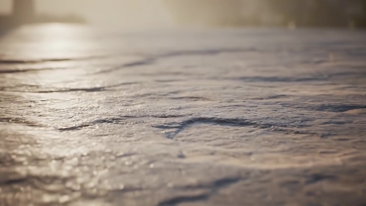 Close-up of Rippling Water Surface at Sunset