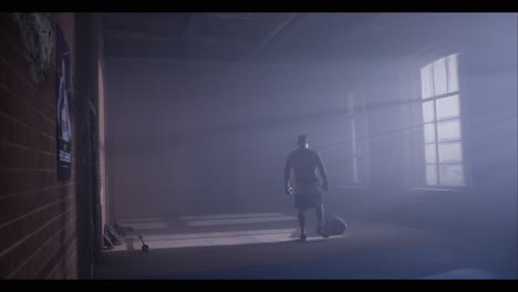 man training in a boxing gym