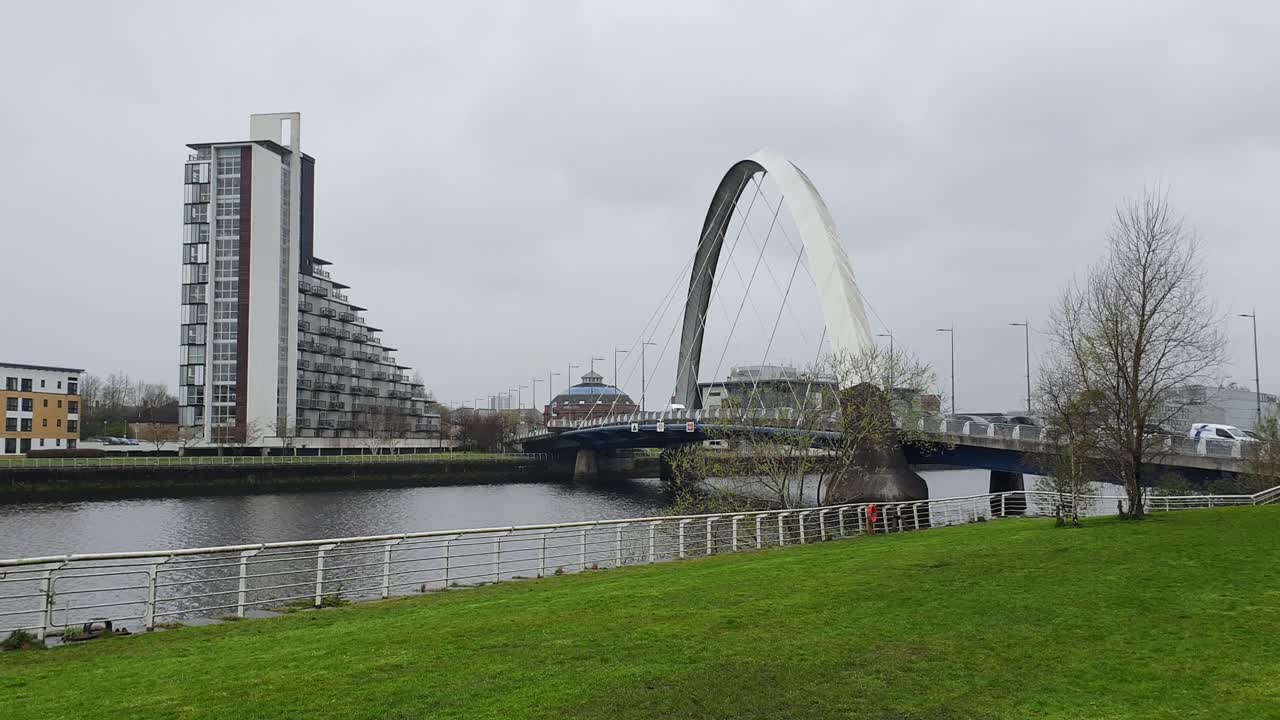 Clyde Arc bridge over River Clyde with riverside apartments in Glasgow, Scotland UK
