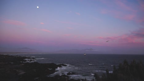 the image shows a coastal landscape at sunset