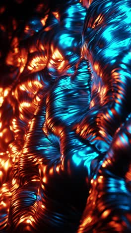 close up of shiny metal surface with blue and orange lights. vertical looped animation