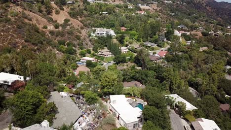 mansions and villas on green hillside of pasadena, los angeles. sunny day in summer. aerial wide shot. noble and luxury houses in mountains of california