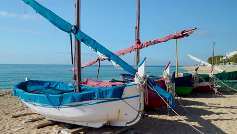 Platja-de-les-Barques-sea-field-Maresme-Barcelona-Mediterranean-coast-plane-close-to-turquoise-blue-transparent-water-beach-without-people