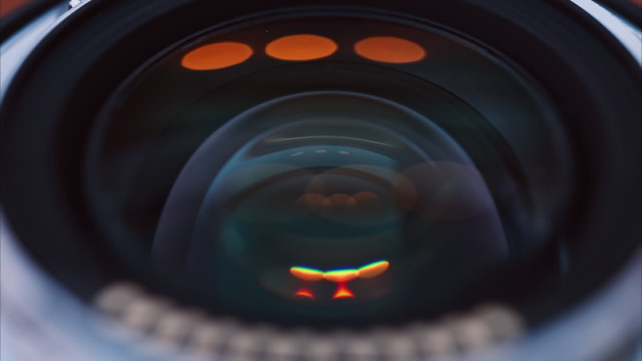 Close up of a camera lens on a wooden table