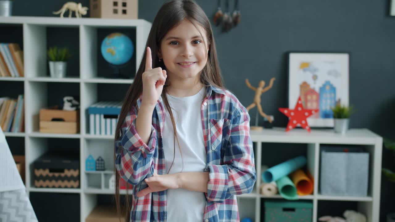 Smiling Girl with Finger Up