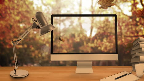 animation of leaves falling over laptop and computer and desk