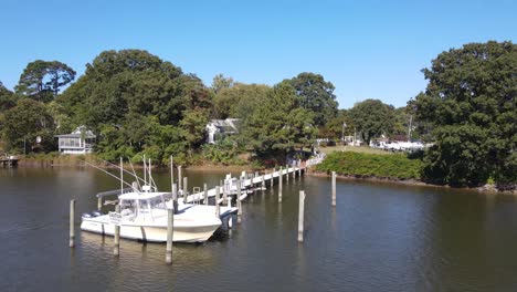 a boat docking off of the chesapeake bay on a nice bright sunny day