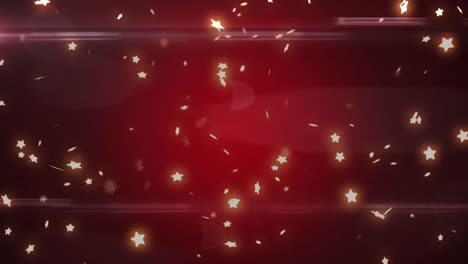 animation of christmas stars falling on red background