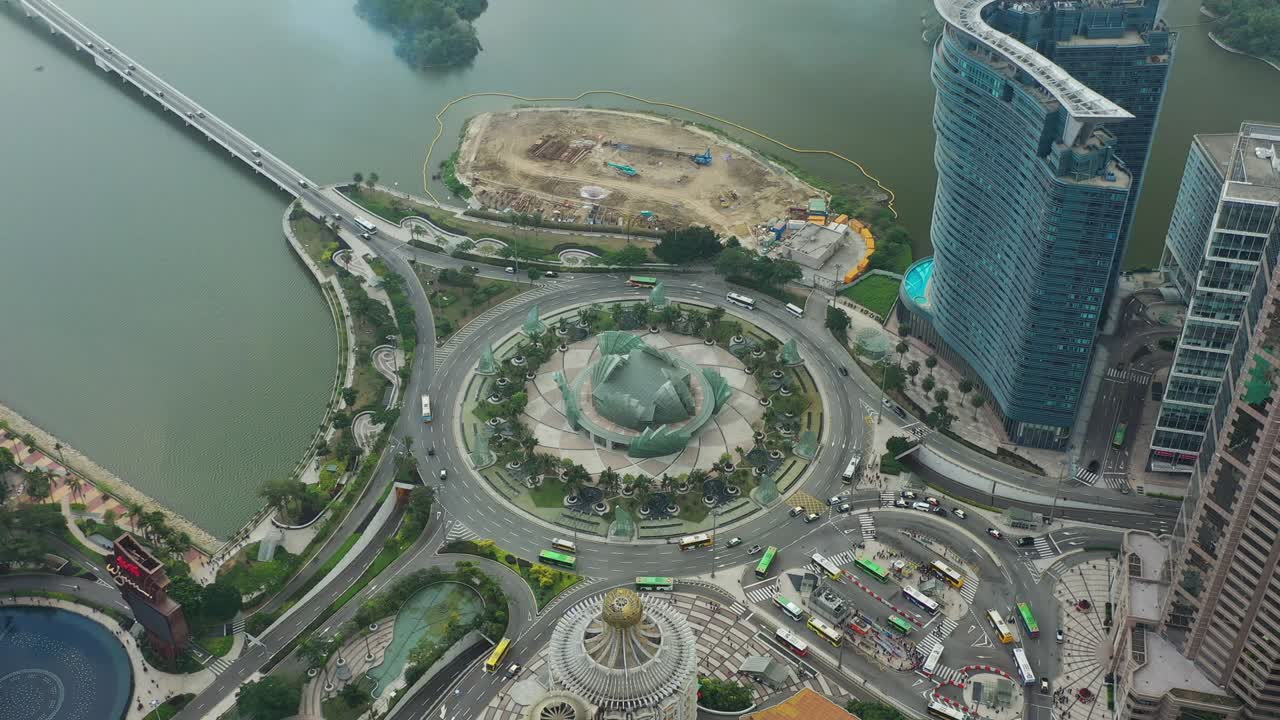 hora do dia macau cidade baía círculo de trânsito rua aérea topdown panorama 4k china