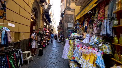 tourists explore vibrant market stalls in naples