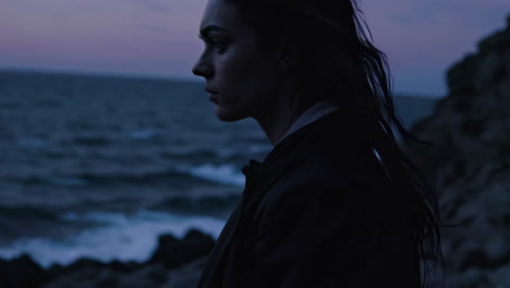 woman on the coast at sunset