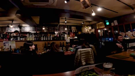 friends enjoying drinks in a cozy bar