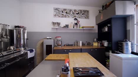 slow establishing shot of a kitchen within a luxury villa in pezenas