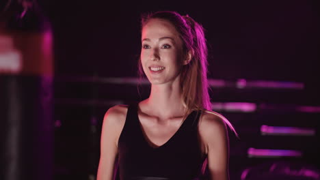 Lockdown-Shot-Of-Beautiful-Confident-Young-Woman-Standing-At-Fitness-Club-3