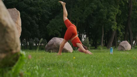 woman practicing yoga outdoors