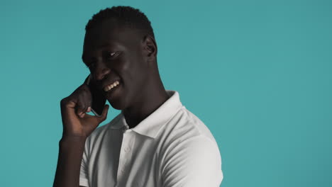 African-american-man-on-blue-background.