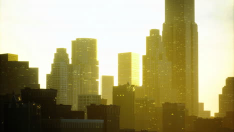 golden skyline at sunset over a bustling urban cityscape
