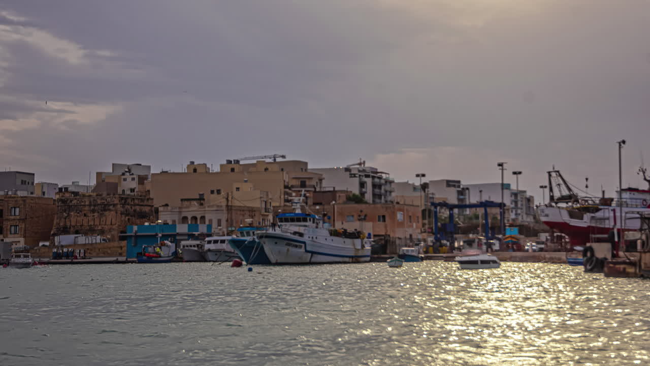 marsaxlokk puerto puerto puesta de sol noche timelapse, soleada isla de malta
