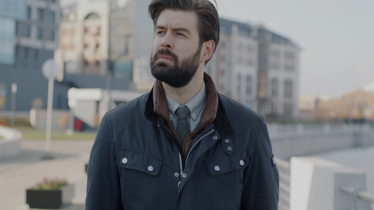 Businessman Checking the Time in the City