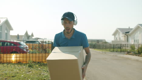 delivery person carrying a package