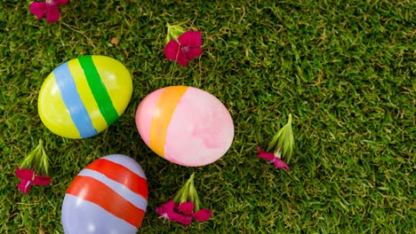 animation of colourful easter eggs on grass