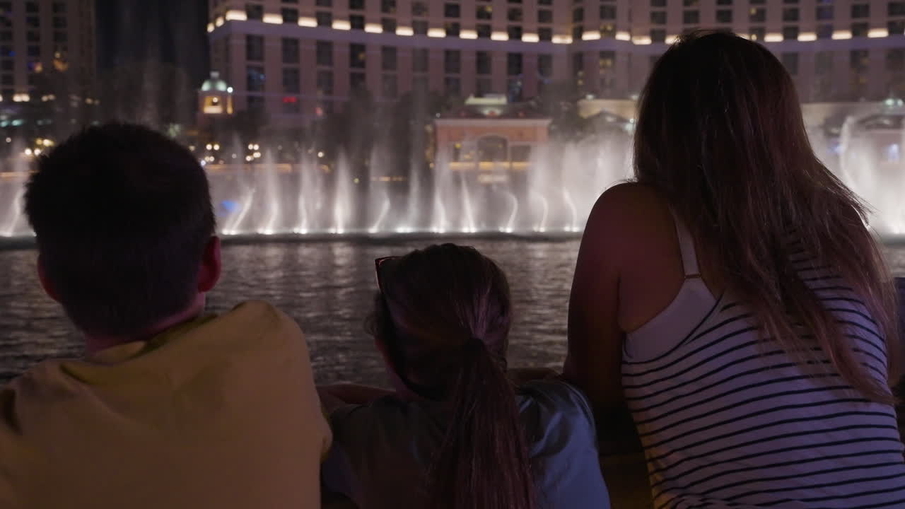 People watching a nightly fountain show