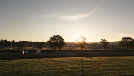 sunrise over a suburban landscape