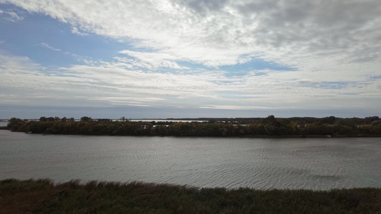 View from the Kiskore Labashaz lookout tower towards the Abadszalok basin of the Lake Tisza dotted with islands in Hungary.