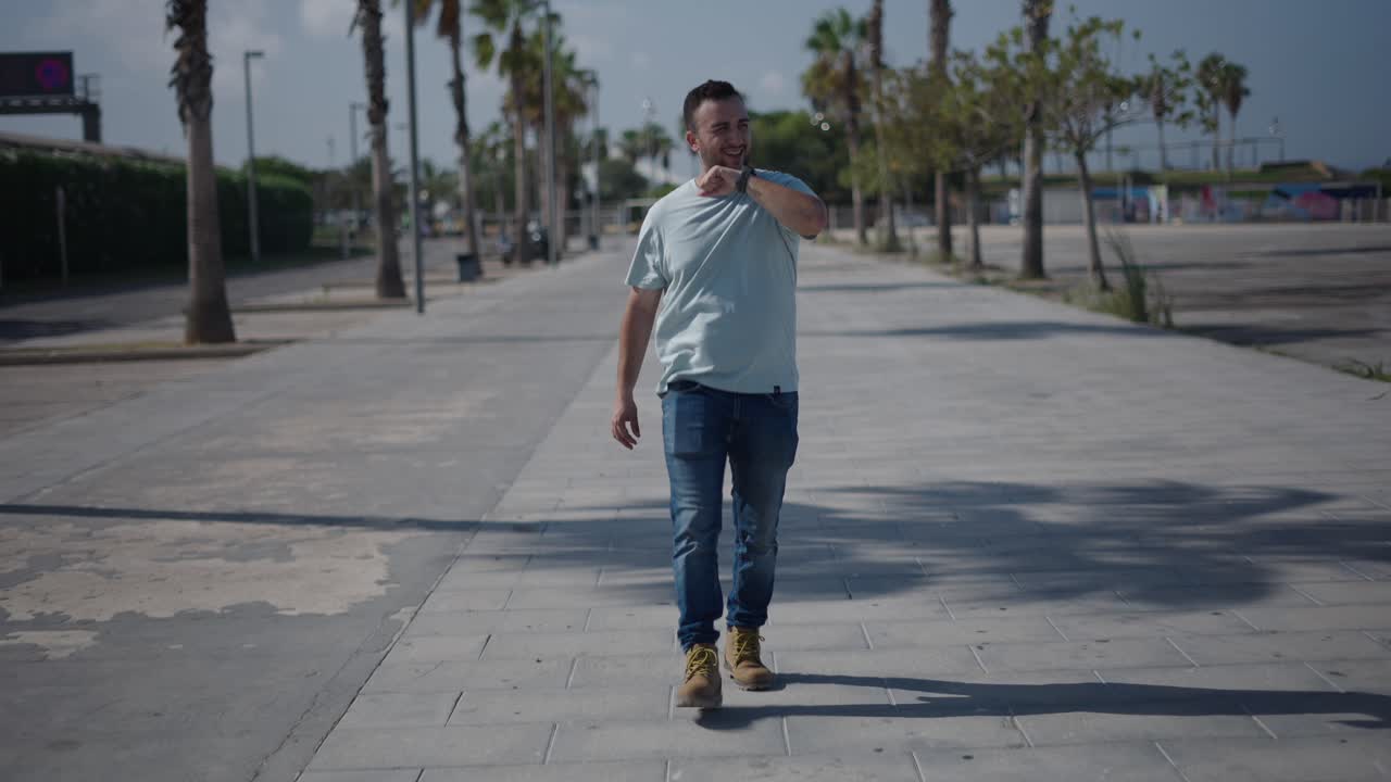 Man walking on a city sidewalk