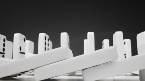 low angle shot of dominoes falling