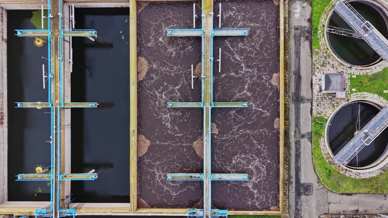 Water purification process in a treatment plant shows tanks and filters
