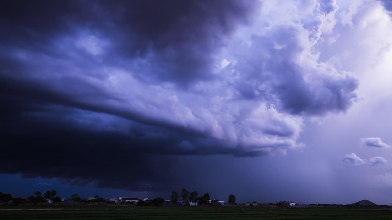 Dramatic Tropical Monsoon Storm Cloud Rotating and Lightning