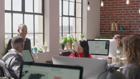 young-business-people-meeting-african-american-team-leader-woman-using-tablet-computer-showing-creative-project-ideas-on-screen-sharing-strategy-colleagues-collaborating-in-office-briefing