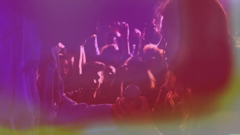 female singer grabbing microphone on music stage, showing animated soundwave and smartphone metrics