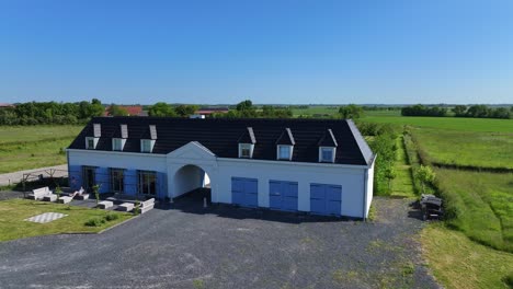 orbital drone view: dutch coastal home in zoutelande, netherlands