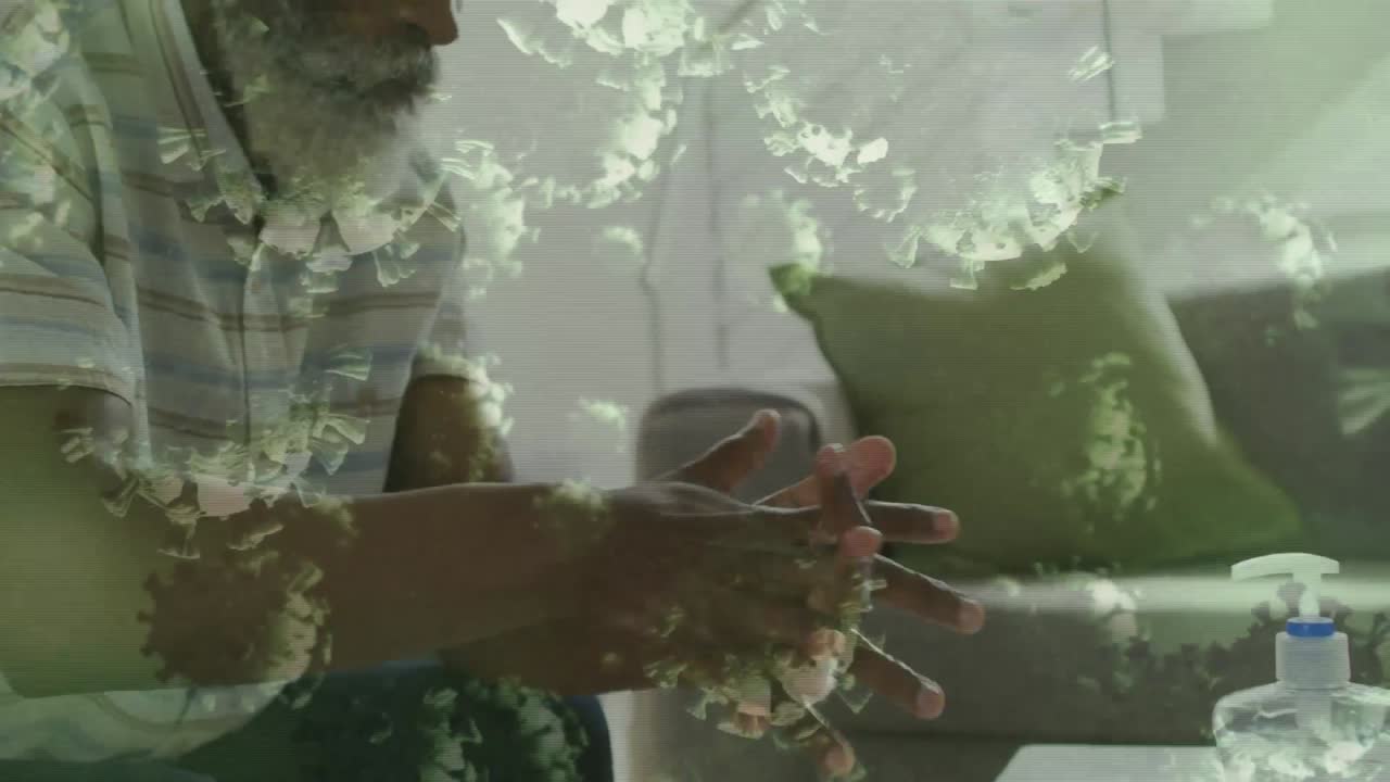 animación de células de covid 19 sobre una persona lavando las manos