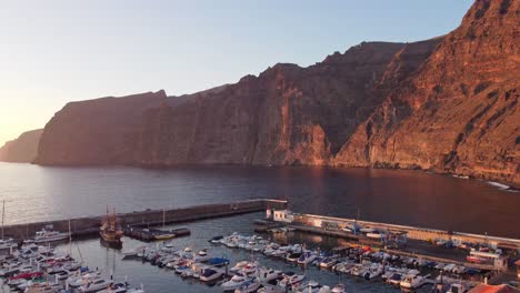 boats parked in harbour of los gigantes