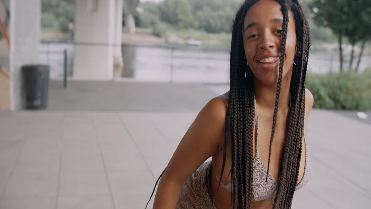 Woman dancing in city