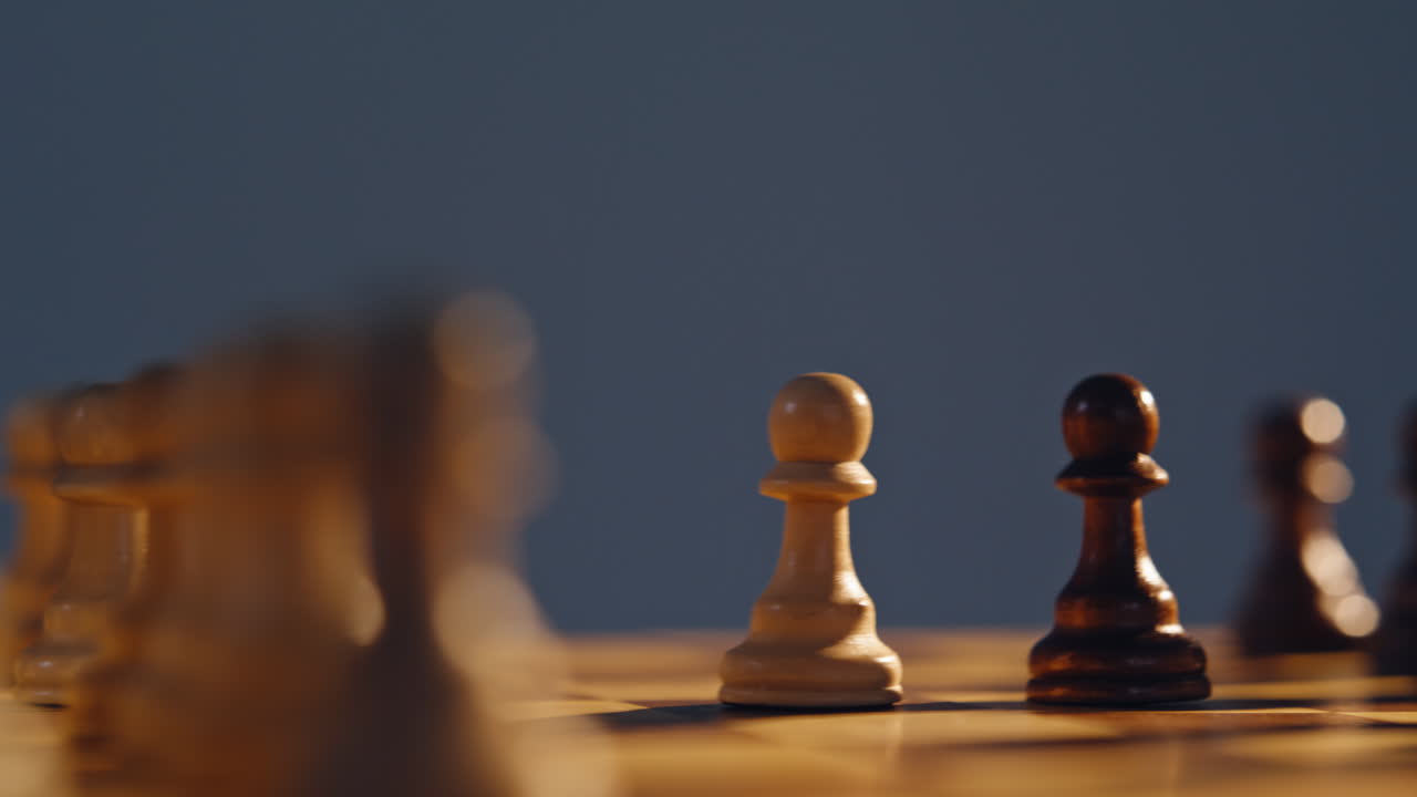 Chess figures arranged board closeup. Mental battle opening phase in progress