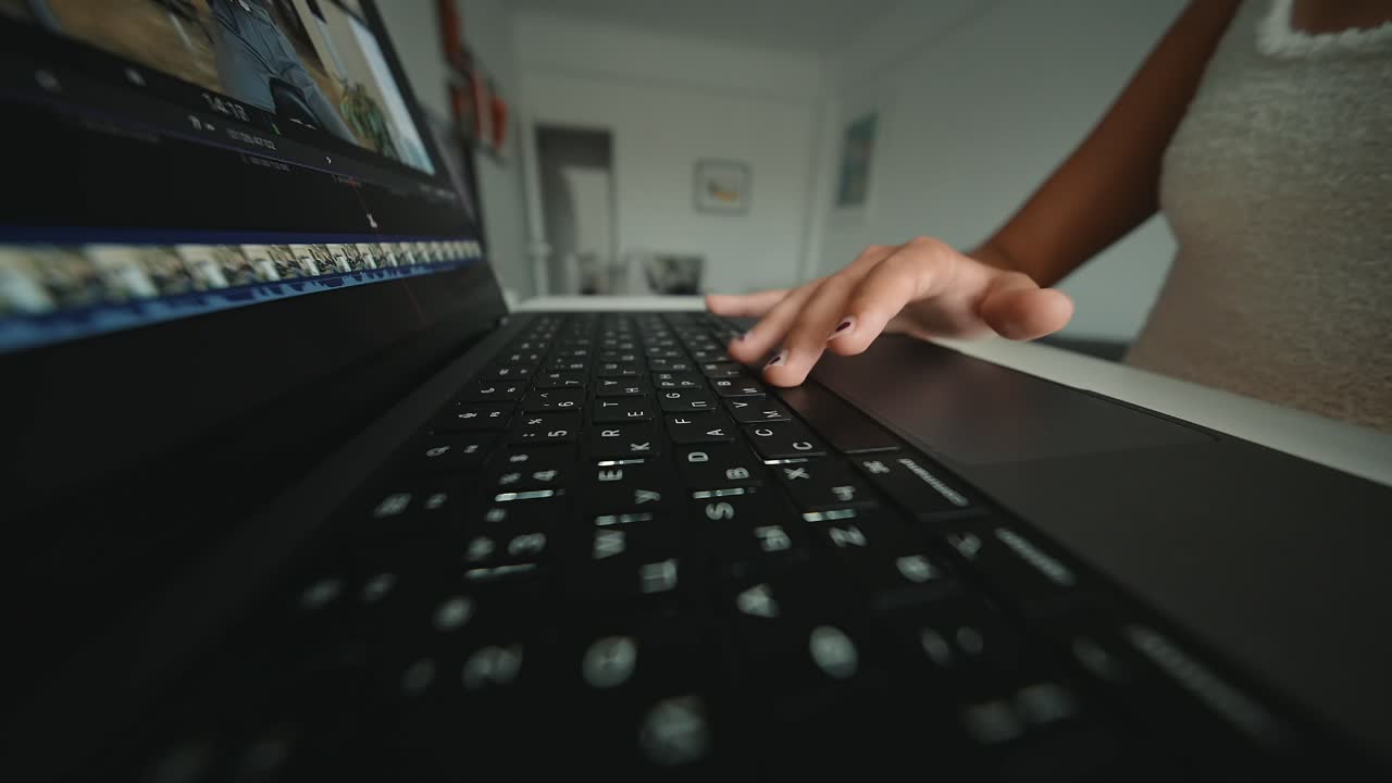 Close-up of a person using a laptop