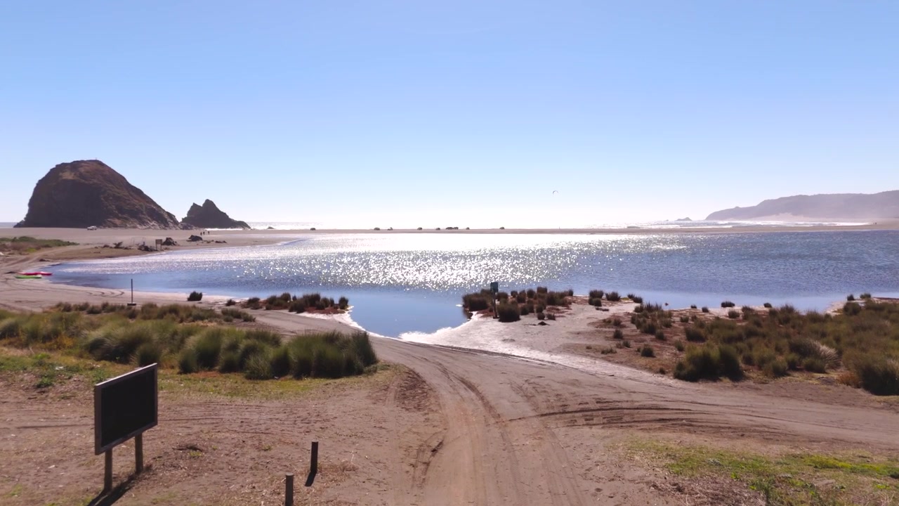 Santuario Piedra Viento Topocalma Chile coastal landscape beach sea nature rock formations