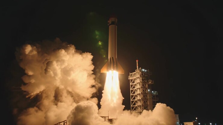 Igniting engines, launch vehicle lifting off pad gantry night, plume billowing, climbing to orbit