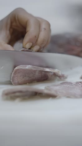 slicing cooked beef tongue