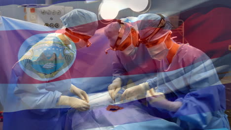 수술실 에 있는 외과 의사 들 위 에 흔들리는 코스타리카 의  ⁇ 발 의 애니메이션