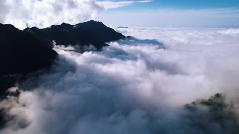 clouds cover hill landscape of nepal, drone shot of nature's early morning blue sky hills serene vibrant environment peace and calm