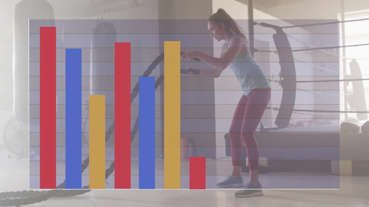 animación de diagramas sobre una deportista caucásica haciendo ejercicio con cuerdas en el gimnasio