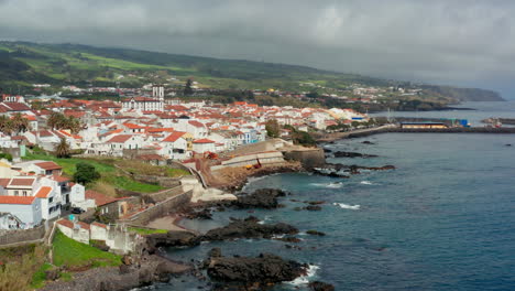 aerial drone view of the beautiful local town of vila franco do campo, sao miguel island, azores - portugal