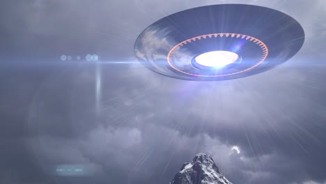 ufo over snowy mountain range