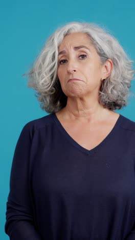 mature woman showing fatigue and discomfort